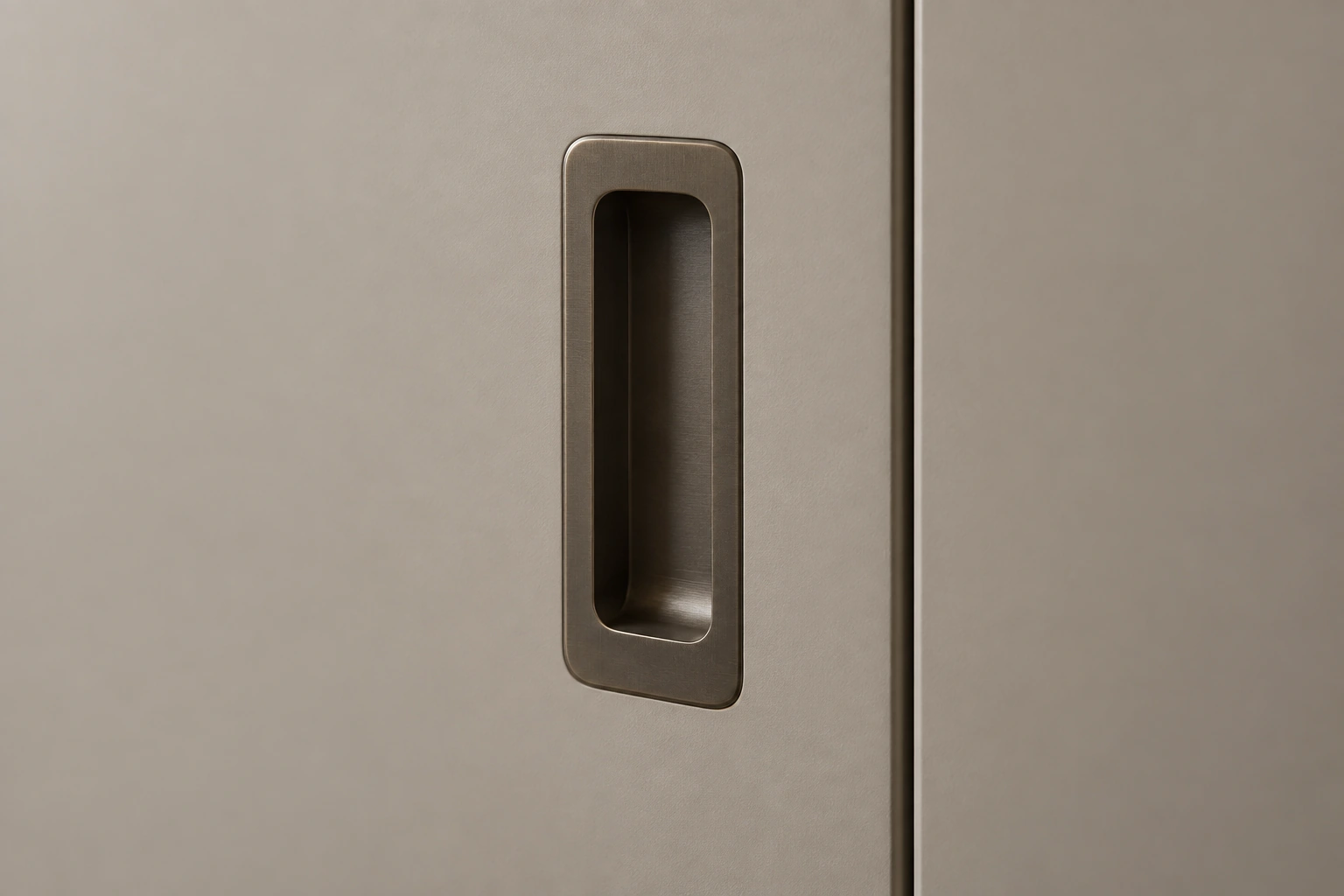 Front-face recessed cabinet pull — installed cabinet view